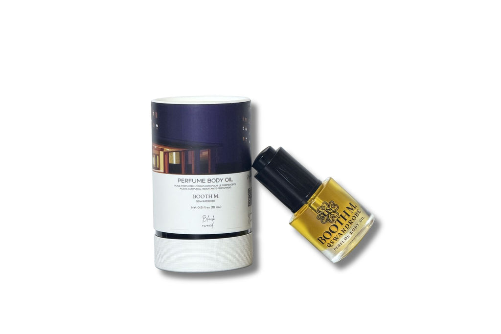 Perfume body oil bottle and cylindrical container on a white background