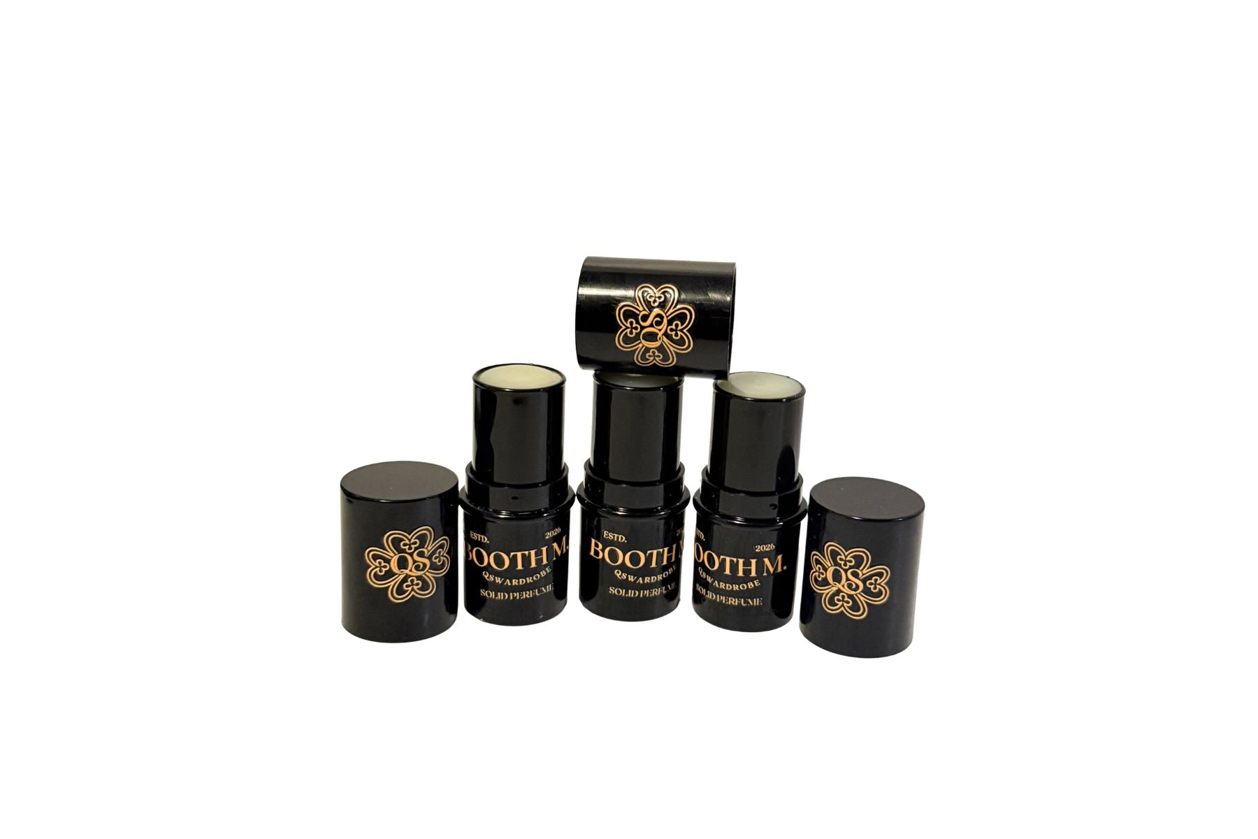 Set of black and gold cosmetic containers with 'Gothic' branding on a white background