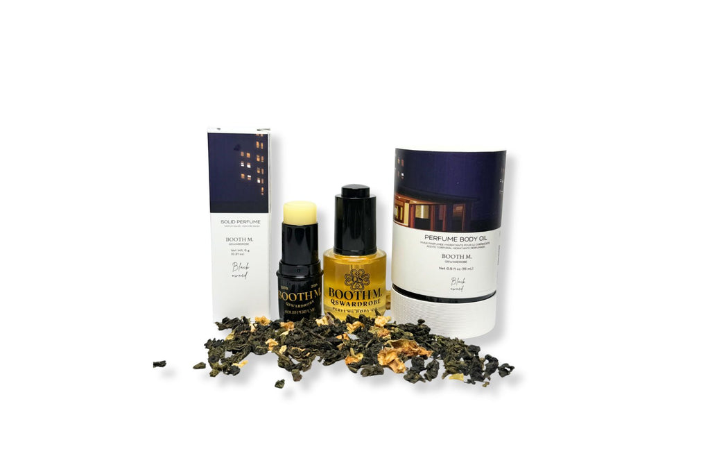 Cosmetic products with tea leaves on a white background